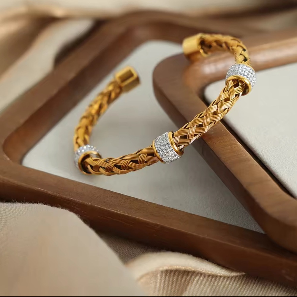 Elegant Gold and Silver Braided Bracelet
